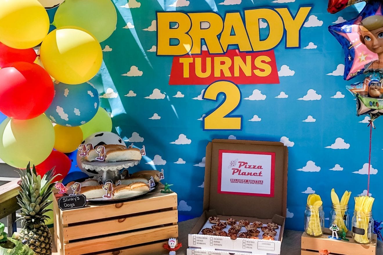 Backyard party for a two-year-old with a Toy Story theme.